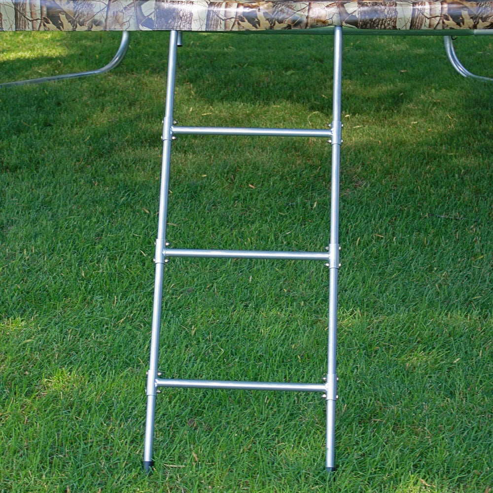 The trampoline ladder is hooked onto a trampoline with a camo spring pad. 